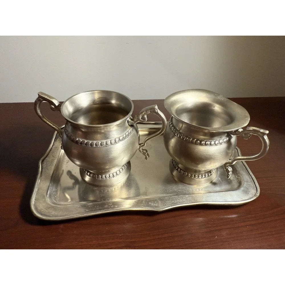 vintage silver-plated creamer and sugar bowl set with a matching tray Unbranded